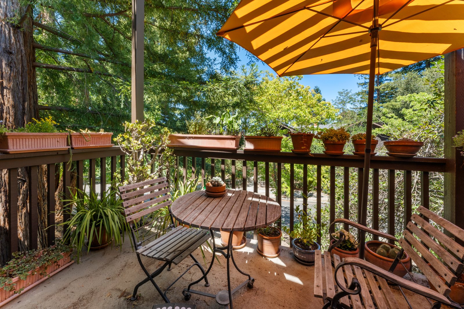 Al fresco dining setting on the private deck